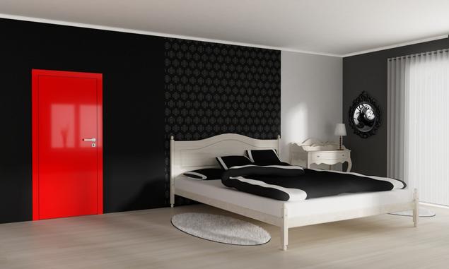 Kolory w sypialni: czerwony, czarny i biały. Odważna aranżacja sypialni